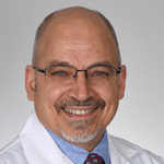 Dr. John Comisi
